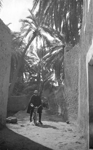 Biskra, Algeria - Garnett on Cycle in Alley